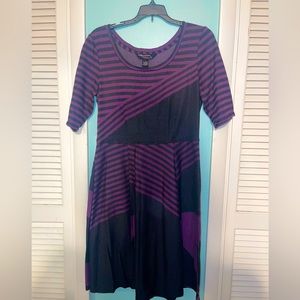 Beautiful, gently used purple and black dress, size large. Barely worn.